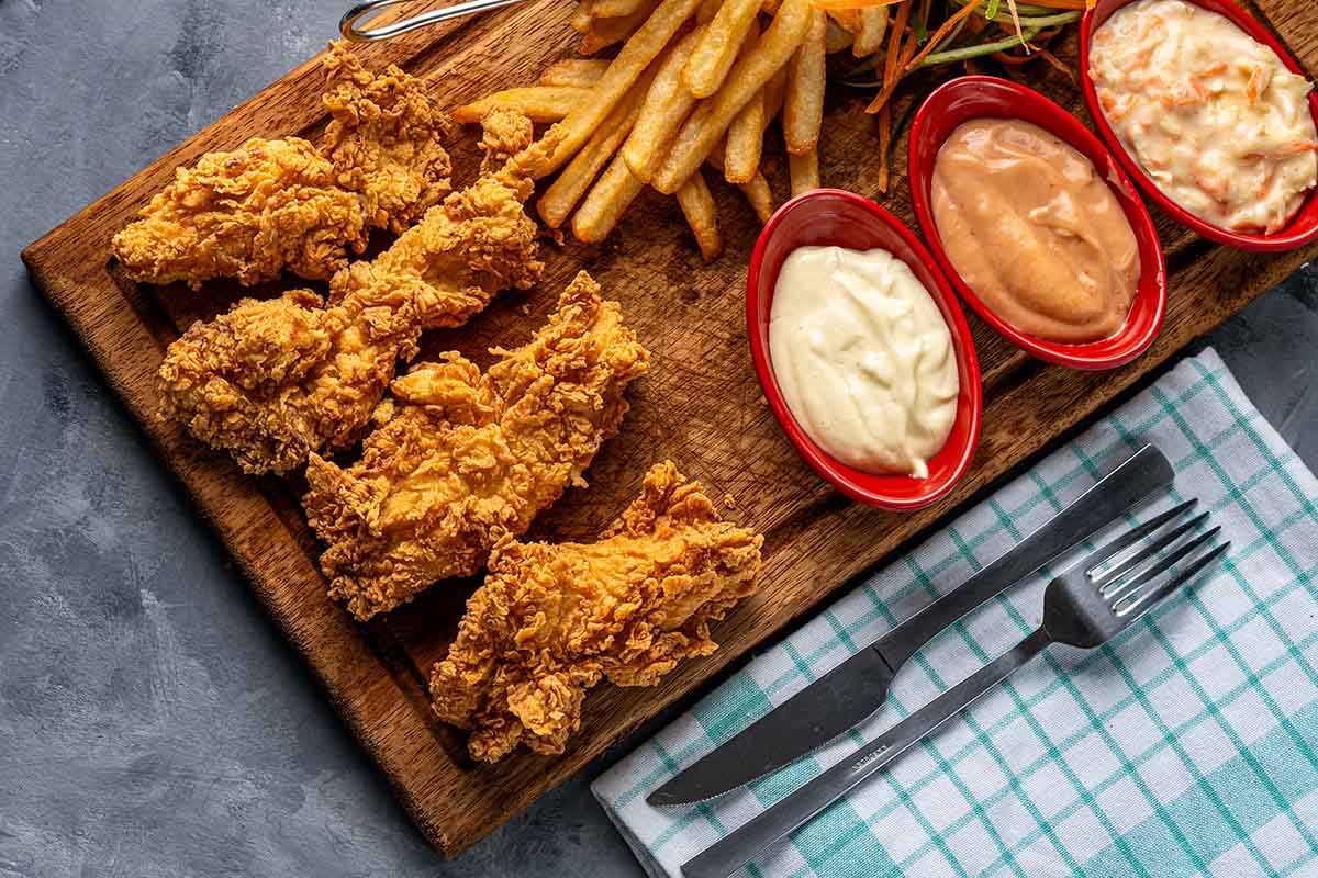 What Makes Fried Chicken Not Crispy? A Comprehensive Guide 1 Why fried chicken isn't crispy, Fried chicken not crispy reasons, How to make fried chicken crispy, Fixing soggy fried chicken
