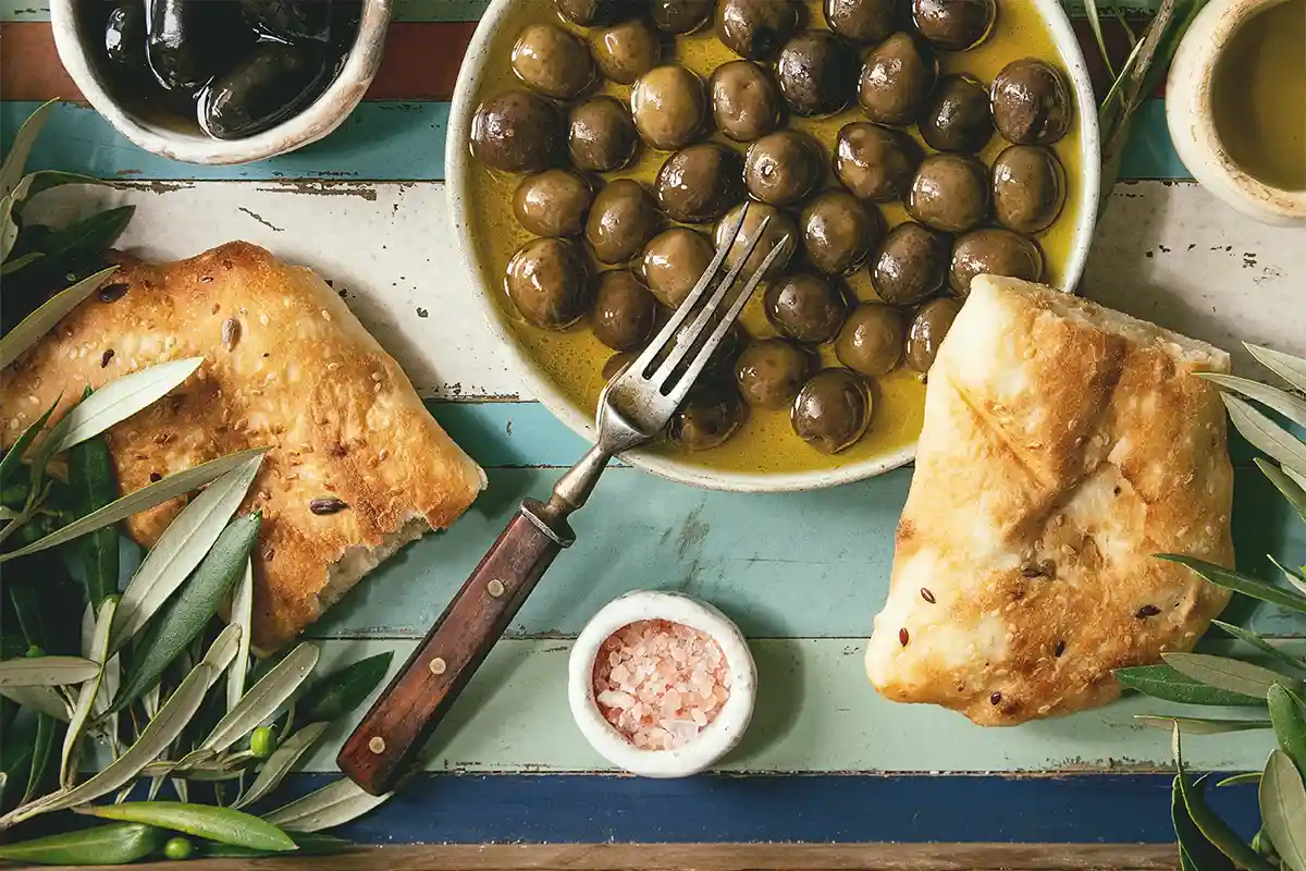 How Many Olives Should I Eat a Day? 1 Learn how many olives you should eat daily. Discover the health benefits, recommended intake, and how to incorporate olives into your diet.