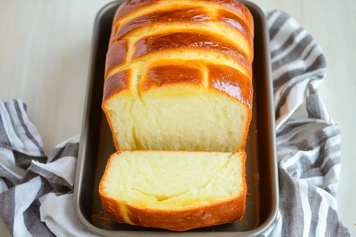 Easy Sweet Condensed Milk Bread you'll fall in love with ! 24 This Sweet Condensed Milk Bread is soft, fluffy, and lightly sweet. Perfect for breakfast, sandwiches, or toast! Easy to make and so delicious