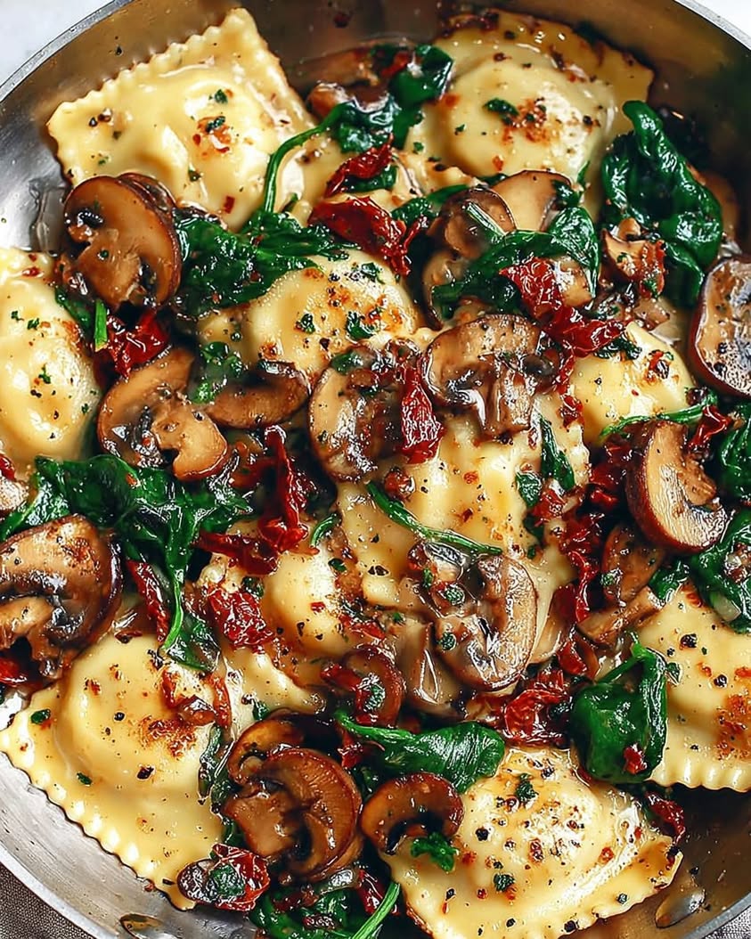 Creamy Cheesy Ravioli with Spinach and Sun-Dried Tomatoes 3 cheesy ravioli spinach mushrooms tomatoes
