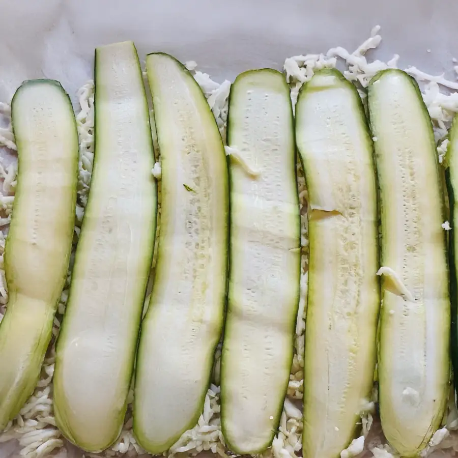 Ingredients for zucchini breadwich on marble surface